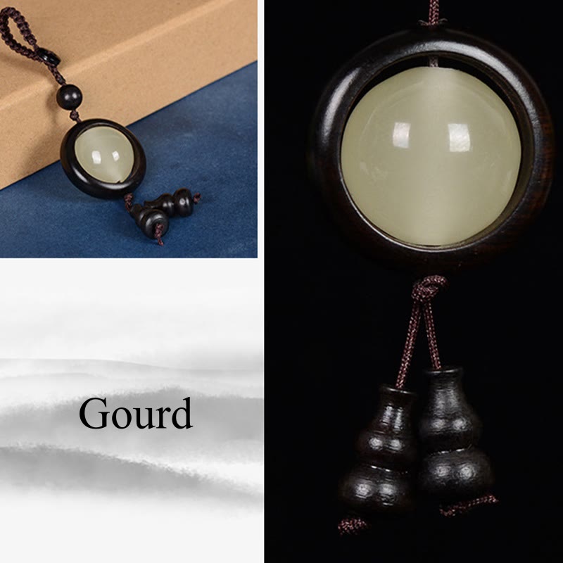 Porte-clés gourde porte-bonheur lumineux en bois de santal rouge, bois d'ébène et bois de santal vert Foviel