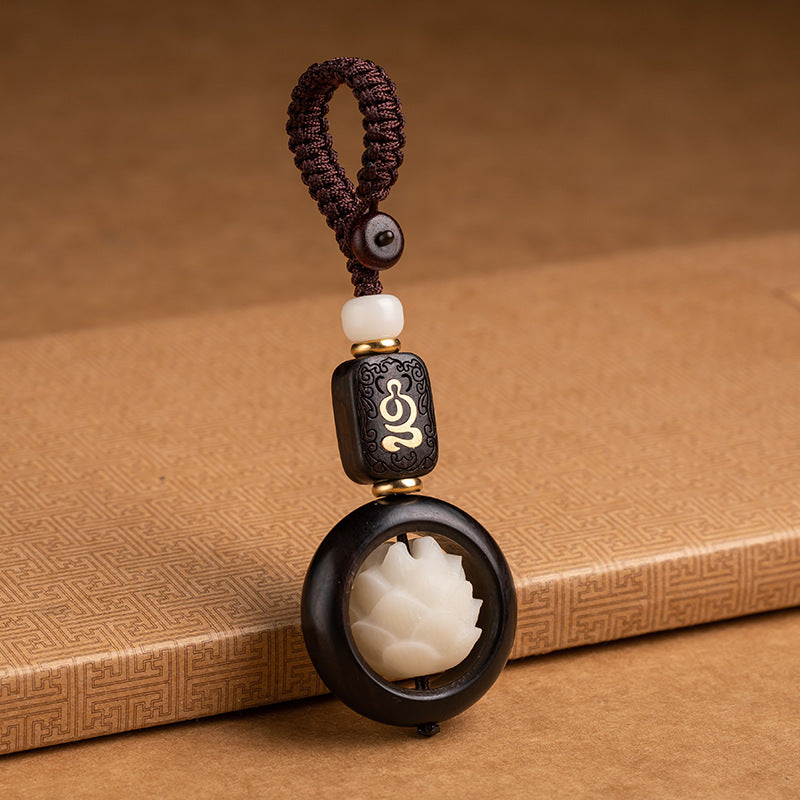 Porte-clés de décoration Foviel en bois d'ébène et graines de Bodhi motif lotus de l'éveil