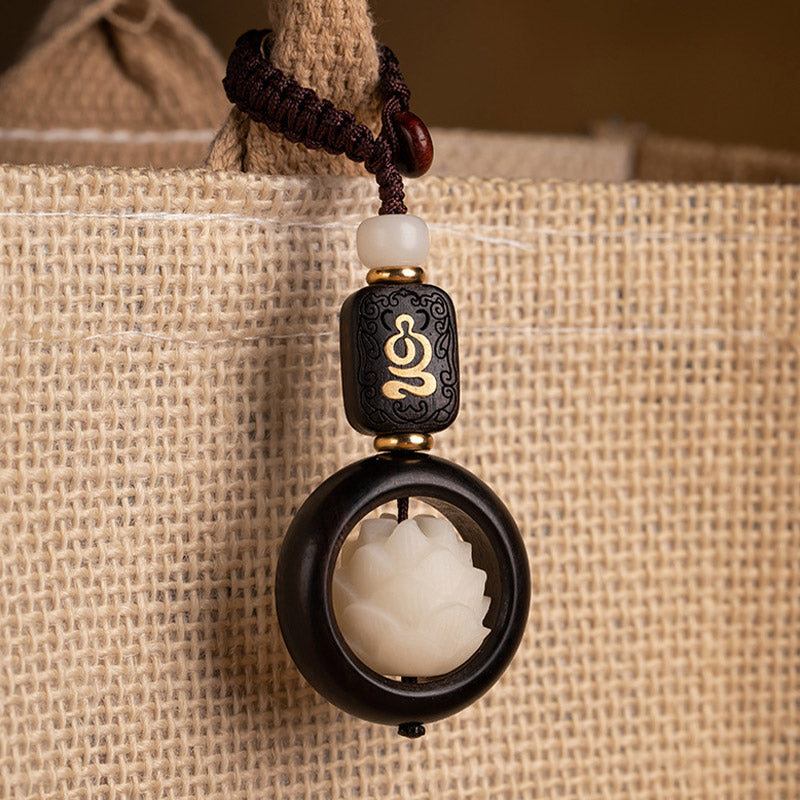 Porte-clés de décoration Foviel en bois d'ébène et graines de Bodhi motif lotus de l'éveil