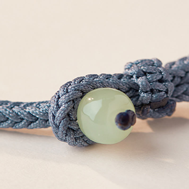 Bracelet porte-bonheur tressé avec boucle de paix en jade de Hetian Foviel motif lotus