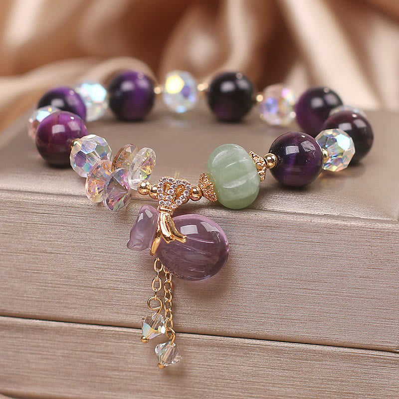 Bracelet de courage Foviel en œil de tigre violet, cristal blanc, améthyste et jade
