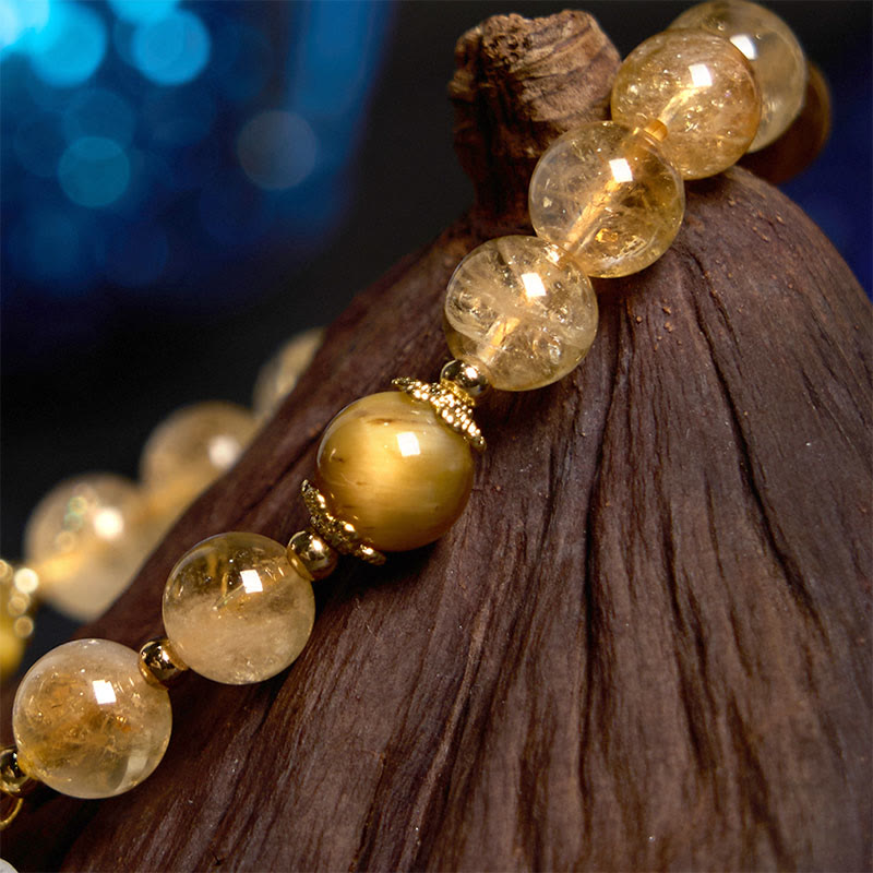 Bracelet fleur à breloque générosité Foviel en citrine et œil de tigre