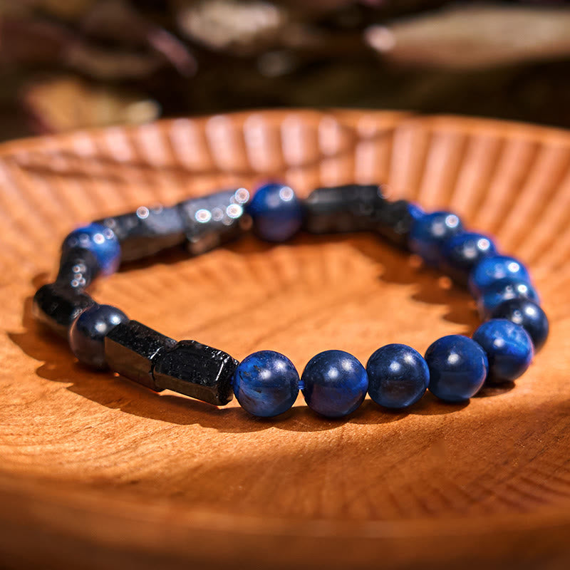 Bracelet de force Foviel en œil de tigre bleu et tourmaline noire