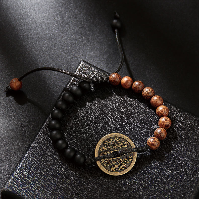 Bracelet de paix Foviel en bois d'ébène et bois de wengé avec pièce de monnaie en cuivre Bagua et motif de fantômes de montagne