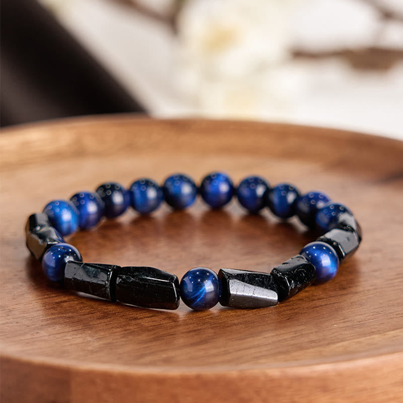 Bracelet de force Foviel en œil de tigre bleu et tourmaline noire