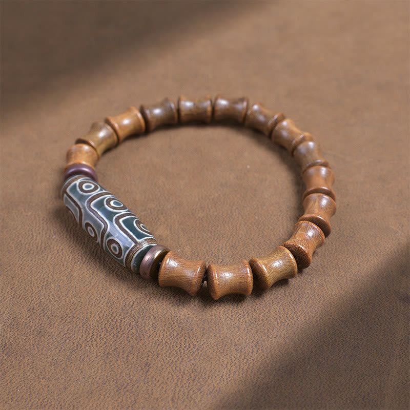 Bracelet de paix Foviel en bois de santal vert avec perle Dzi tibétaine à neuf yeux
