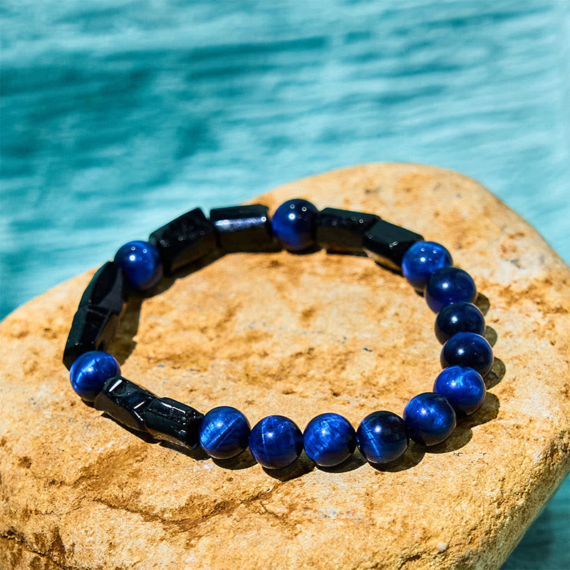 Bracelet de force Foviel en œil de tigre bleu et tourmaline noire