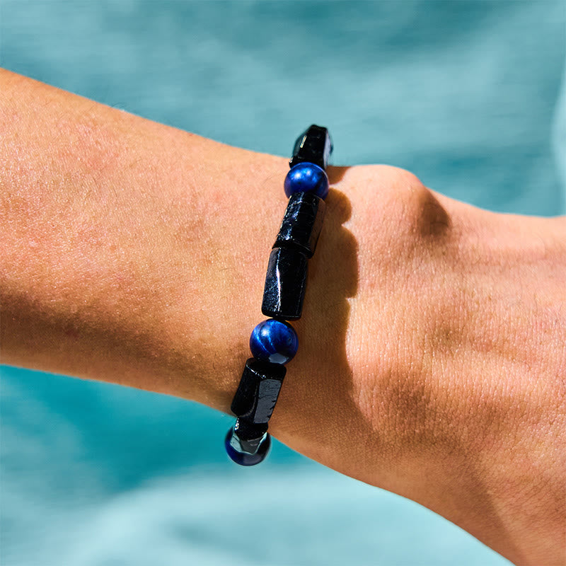 Bracelet de force Foviel en œil de tigre bleu et tourmaline noire
