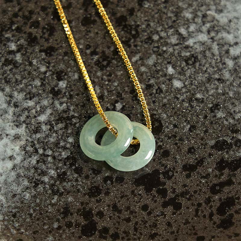 Pendentif de collier prospérité double boucle de paix en jade Foviel
