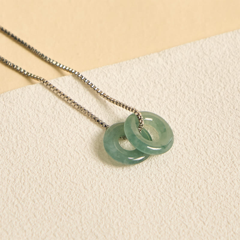 Pendentif de collier prospérité double boucle de paix en jade Foviel