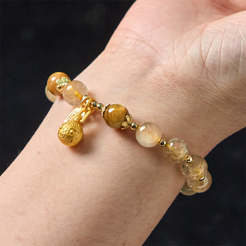 Bracelet Foviel en quartz rutile naturel avec caractère Fu et motif de bête avaleuse de métal porte-bonheur