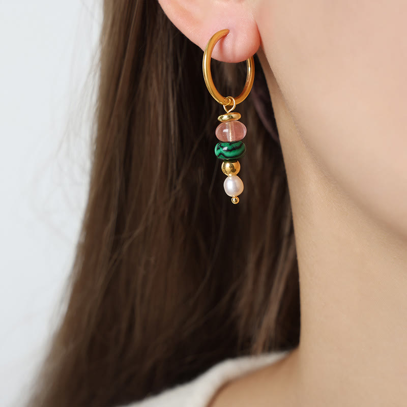 Boucles d'oreilles Foviel en acier titane avec perles en agate rouge naturelle et design de pierre Marnyi tibétaine, symbole de confiance
