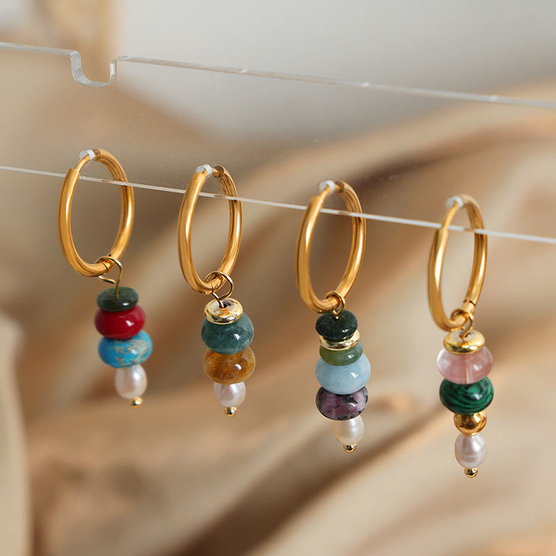 Boucles d'oreilles Foviel en acier titane avec perles en agate rouge naturelle et design de pierre Marnyi tibétaine, symbole de confiance