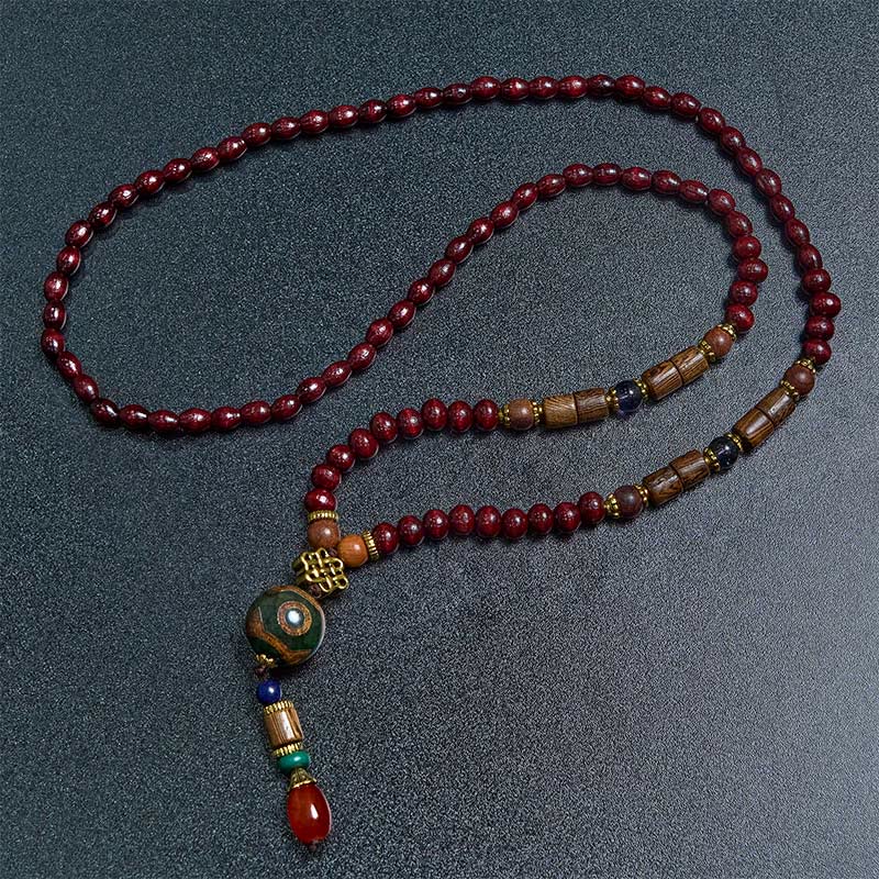 Pendentif de collier Foviel en bois de wengé fait main avec perle Dzi de protection et tête d'éléphant