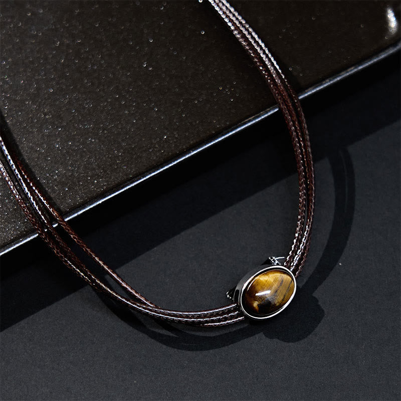 Pendentif collier Foviel en forme d'ellipse en œil-de-tigre naturel avec cordon ciré de protection