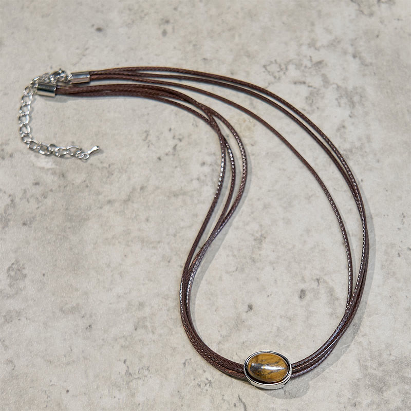 Pendentif collier Foviel en forme d'ellipse en œil-de-tigre naturel avec cordon ciré de protection