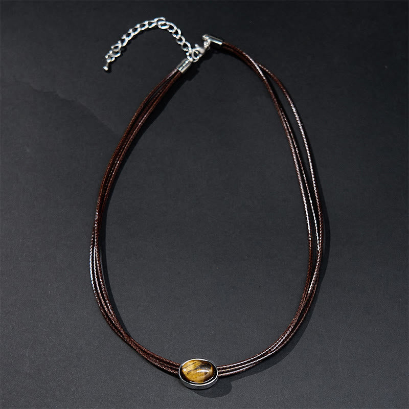 Pendentif collier Foviel en forme d'ellipse en œil-de-tigre naturel avec cordon ciré de protection