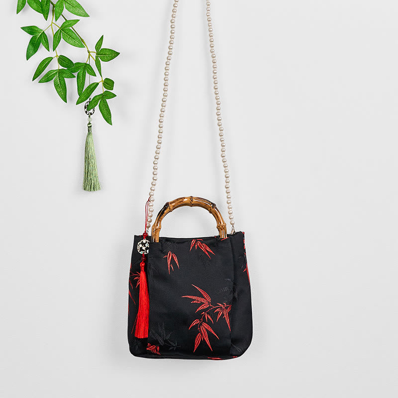 Sac bandoulière Foviel en polyester et coton brodé de feuilles avec anse en bambou et perles