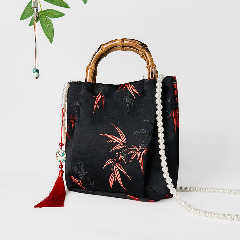 Sac bandoulière Foviel en polyester et coton brodé de feuilles avec anse en bambou et perles