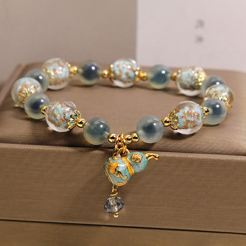 FREE Today: Strength and Harmony Blue Candy Agate Liuli Glass Gourd Charm Bracelet - image 9