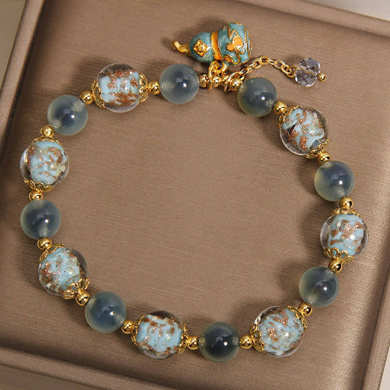 FREE Today: Strength and Harmony Blue Candy Agate Liuli Glass Gourd Charm Bracelet - image 2