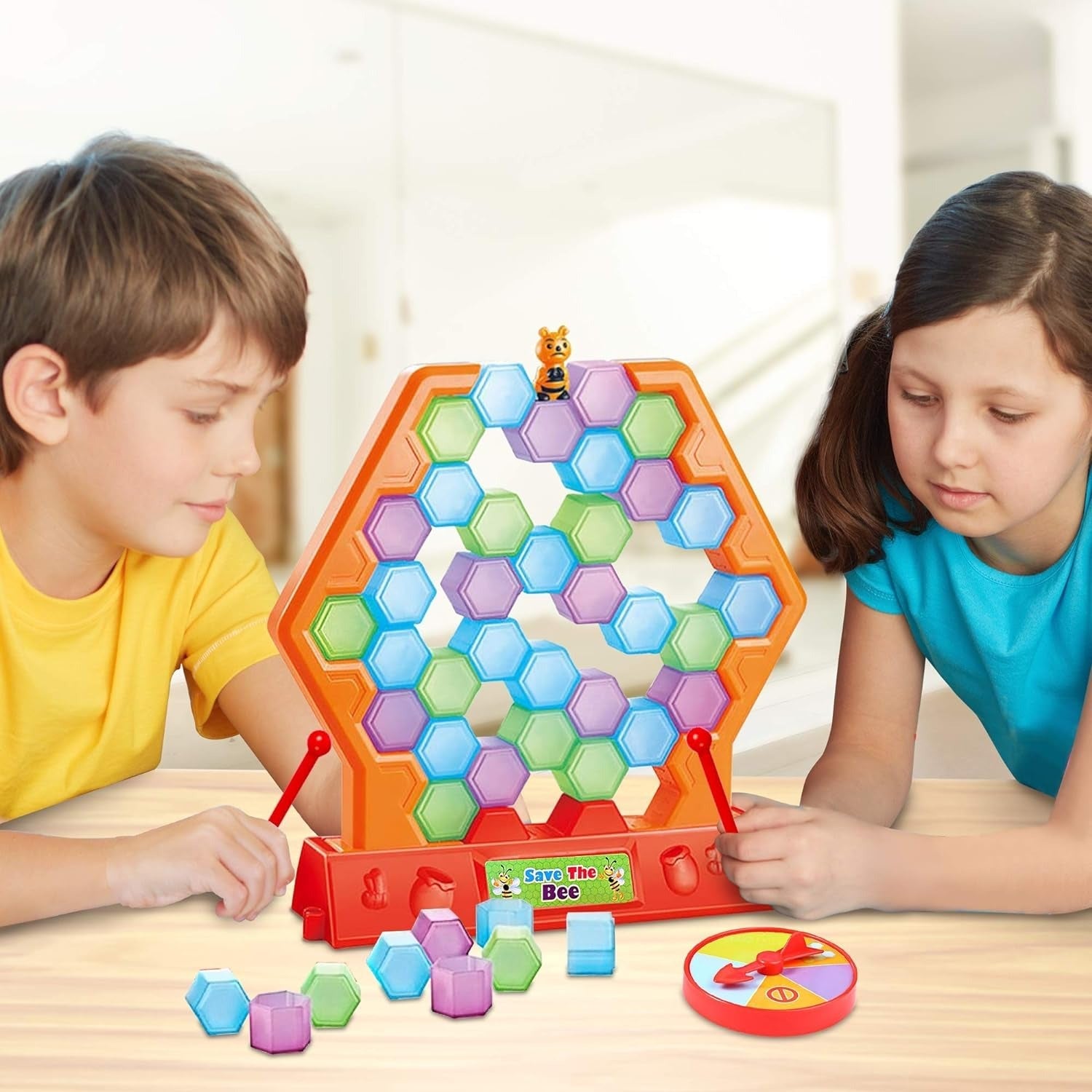 Fidtoy Save the Bee Stacking and Tumbling Game for Kids Ages 3+, Plastic Beehive Balance Board Game with 45 Honeycomb Pieces, 2 Grabbers, Spinner and Bee, Color Recognition Fine Motor Family Game