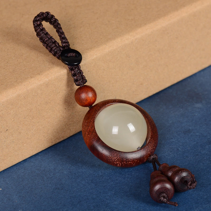 Porte-clés gourde porte-bonheur lumineux en bois de santal rouge, bois d'ébène et bois de santal vert Foviel