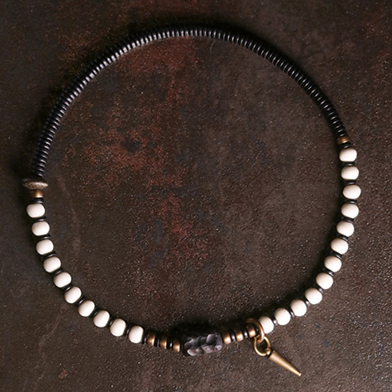 Bracelet de couple Foviel en perles d'os, bois d'ébène et cuivre, symbole de force