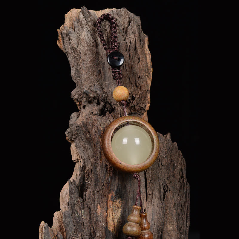 Porte-clés gourde porte-bonheur lumineux en bois de santal rouge, bois d'ébène et bois de santal vert Foviel