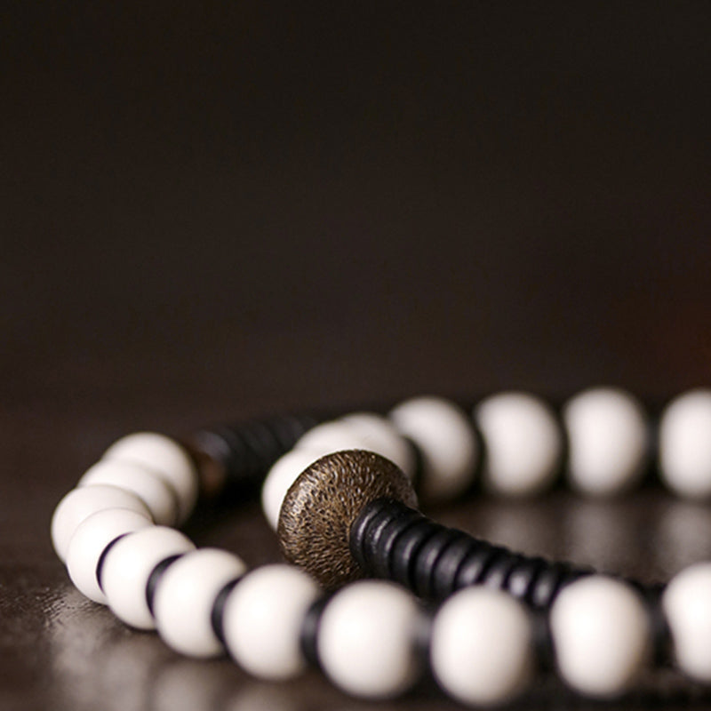 Bracelet de couple Foviel en perles d'os, bois d'ébène et cuivre, symbole de force