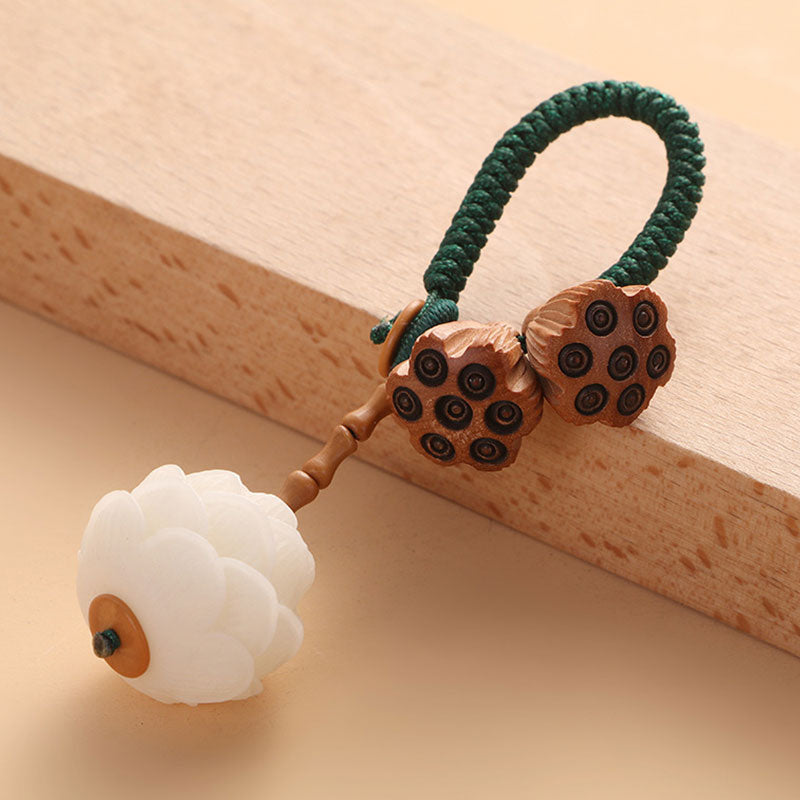 Porte-clés décoration porte-bonheur Foviel Lotus en graines de Bodhi blanc naturel et bois de pêcher