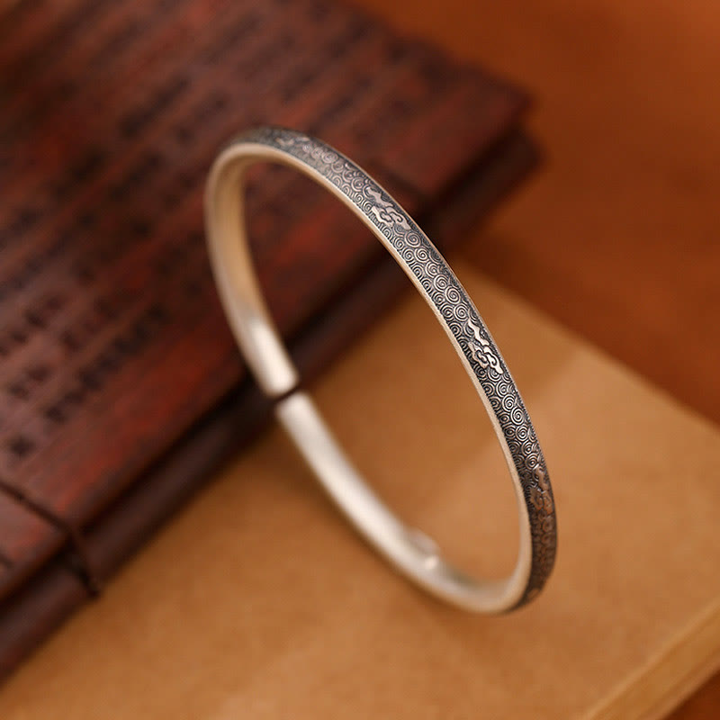 Bracelet jonc Foviel Vintage en argent sterling 999 motif nuages auspicieux