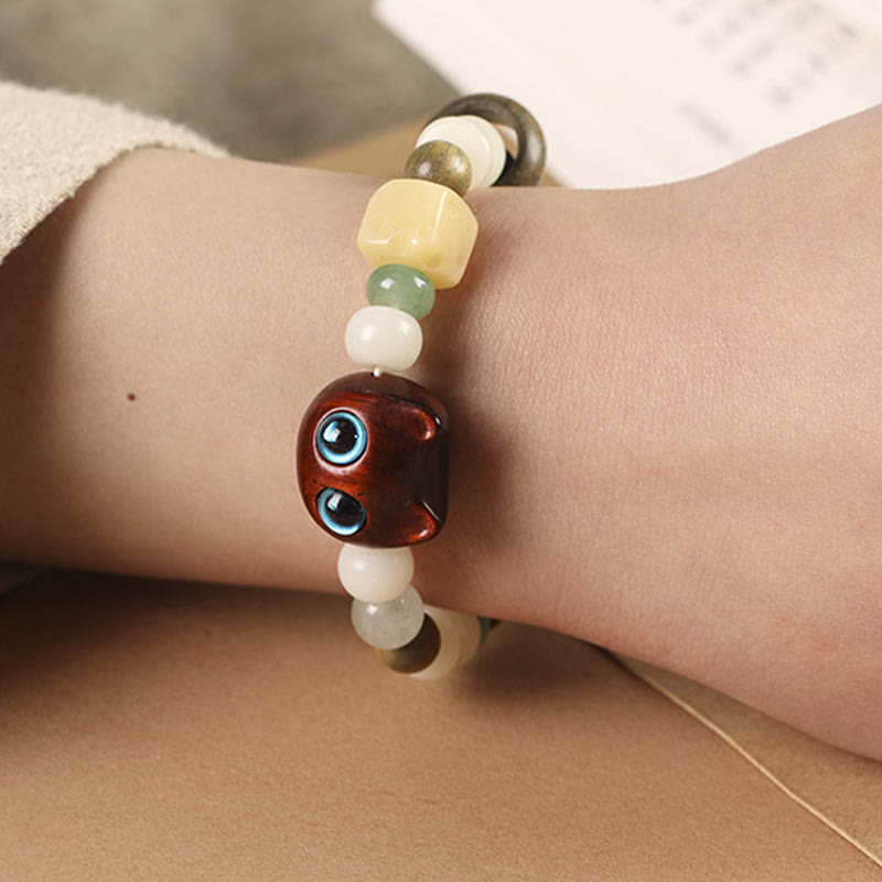 Bracelet de paix Foviel avec tête et patte de chat en graine de Bodhi, bois de santal vert, bois d'ébène et bois de santal rouge à petites feuilles