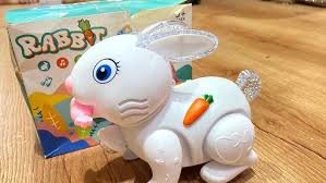 Juguete Musical Fidtoy de Conejo con Luces, Sonidos y Salto
