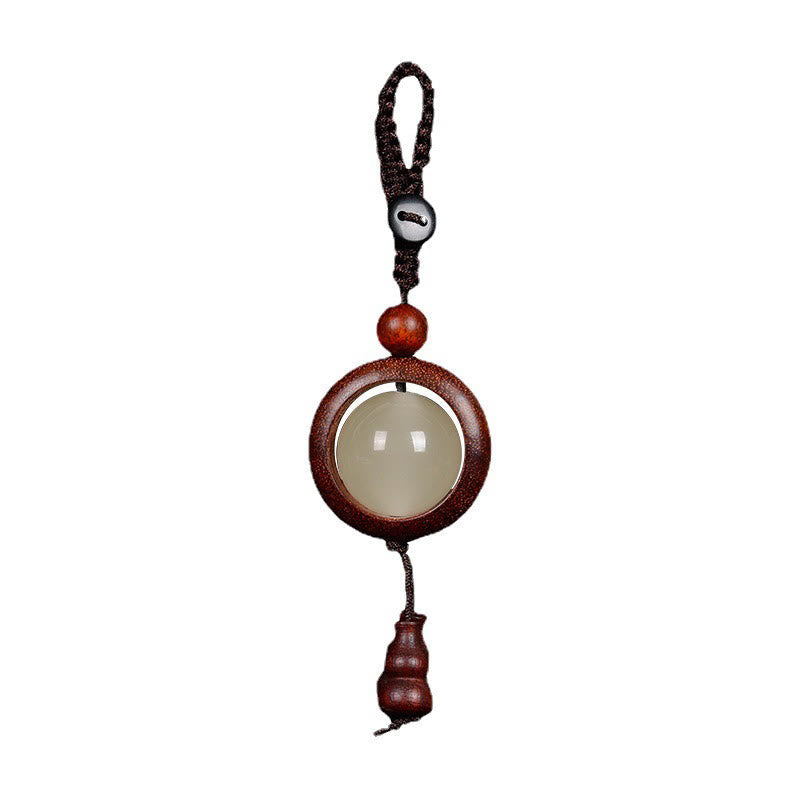 Porte-clés gourde porte-bonheur lumineux en bois de santal rouge, bois d'ébène et bois de santal vert Foviel