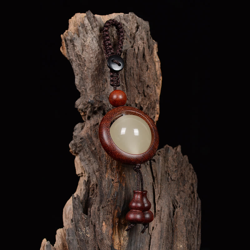 Porte-clés gourde porte-bonheur lumineux en bois de santal rouge, bois d'ébène et bois de santal vert Foviel