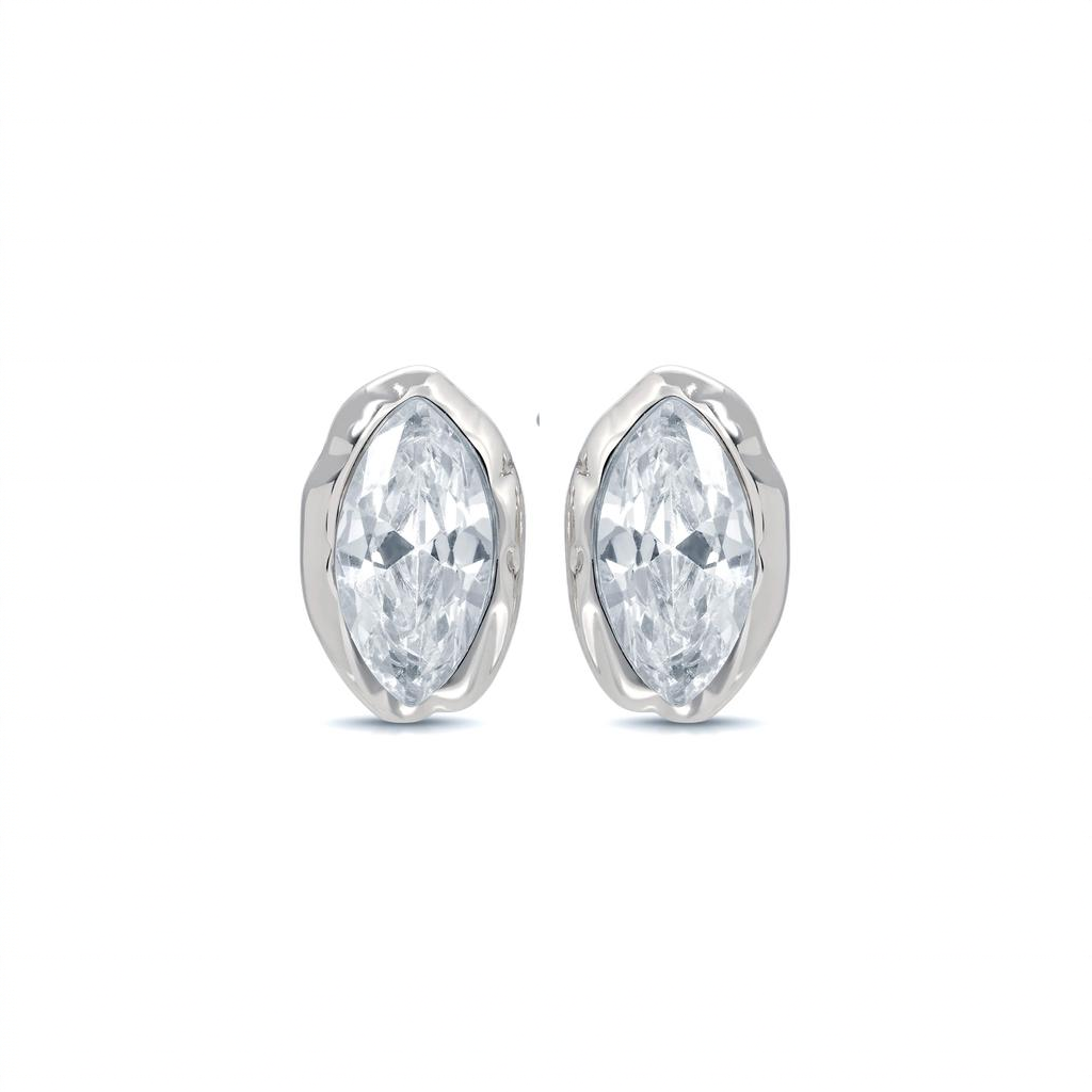 Clear marquise cubic zirconia studs in silver-tone settings on white