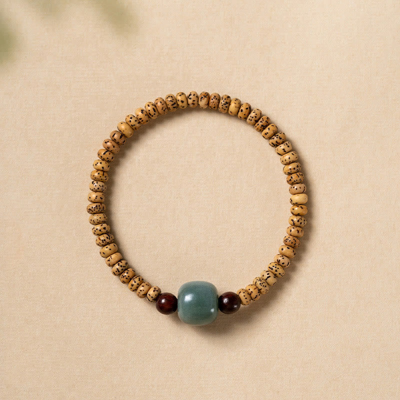 Bracelet de sagesse Foviel en bois de santal rouge à petites feuilles et graines de Bodhi