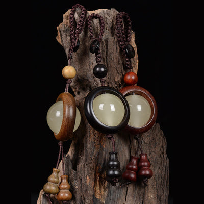 Porte-clés gourde porte-bonheur lumineux en bois de santal rouge, bois d'ébène et bois de santal vert Foviel