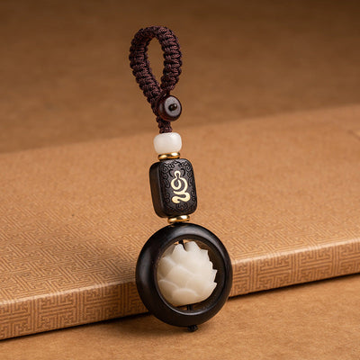 Porte-clés de décoration Foviel en bois d'ébène et graines de Bodhi motif lotus de l'éveil
