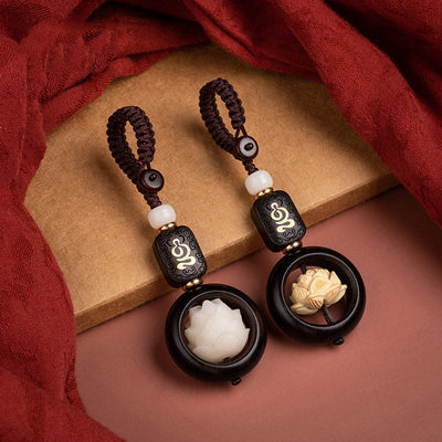 Porte-clés de décoration Foviel en bois d'ébène et graines de Bodhi motif lotus de l'éveil