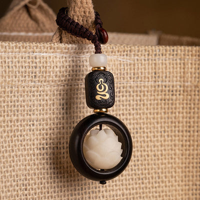 Porte-clés de décoration Foviel en bois d'ébène et graines de Bodhi motif lotus de l'éveil