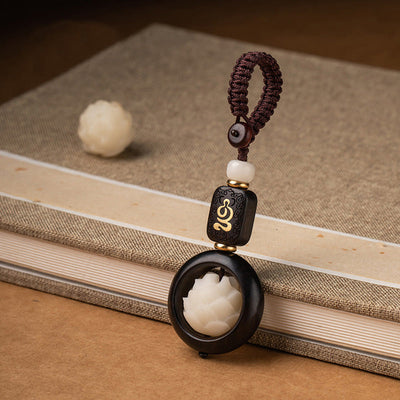 Porte-clés de décoration Foviel en bois d'ébène et graines de Bodhi motif lotus de l'éveil