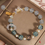 GRATUIT aujourd'hui : Bracelet fleur en cristal bleu et améthyste « Je vous souhaite paix et bonheur »