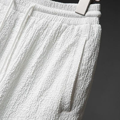 Ensemble deux pièces pour homme Foviel : chemise à manches mi-longues boutonnée et pantalon, texture unie