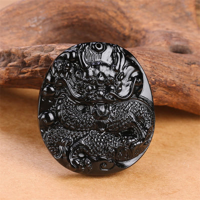 Pendentif collier de protection Foviel en obsidienne noire naturelle sculpté en forme de dragon