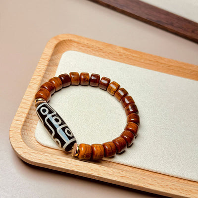 Bracelet de protection Foviel en os tibétain avec perle Dzi à neuf yeux