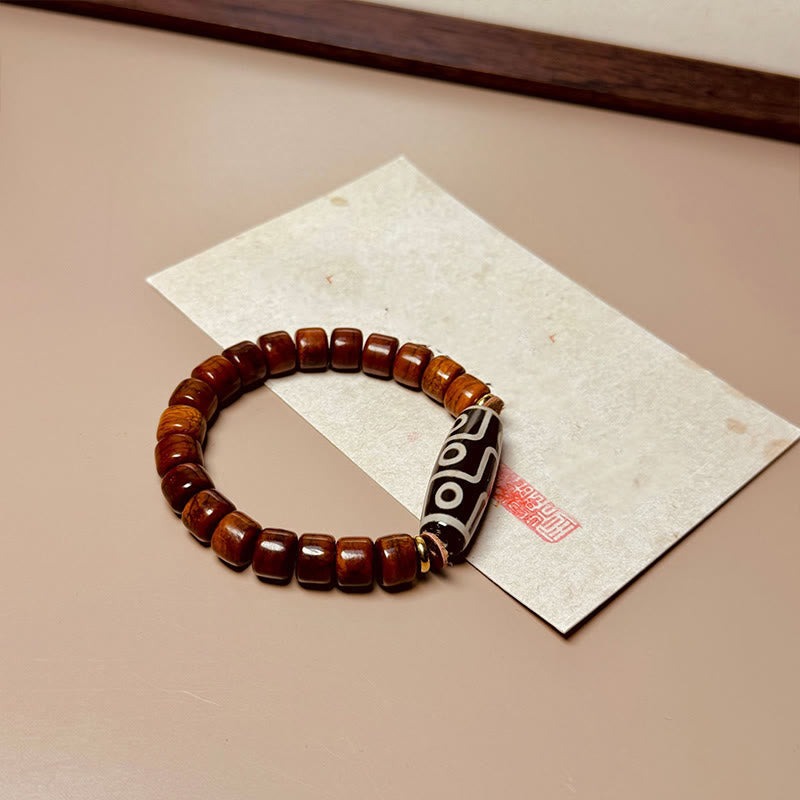 Bracelet de protection Foviel en os tibétain avec perle Dzi à neuf yeux