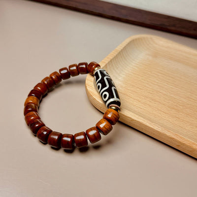 Bracelet de protection Foviel en os tibétain avec perle Dzi à neuf yeux
