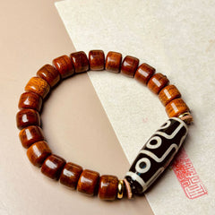 Bracelet de protection Foviel en os tibétain avec perle Dzi à neuf yeux